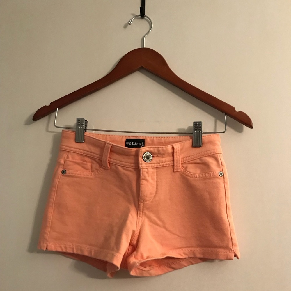 Peach colored “jegging” shorts